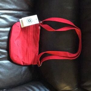 Kipling Red Crossbody Bag with Minimalist Design